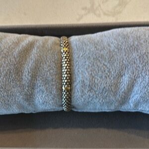 LAGOS sterling silver with 18-karat yellow gold stations. Caviar beaded rope.